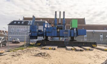 drukpaal hydraulisch aangedreven funderingsmachine drukt prefab paal de grond in.