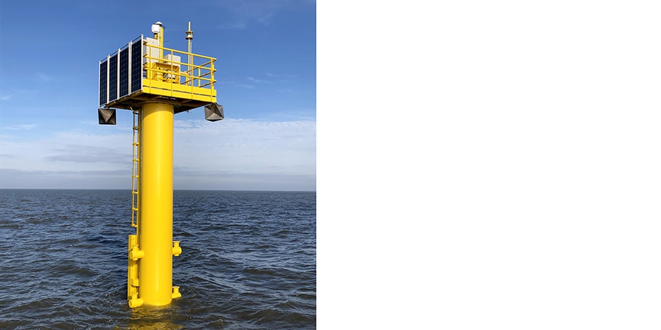 de boer en de groot meetpaal in de waddenzee