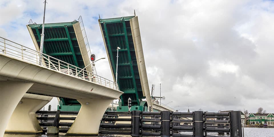 Opening drawbridge over river